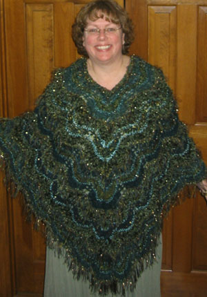 Green Bargello Poncho Using Simultaneous Contrast, designed by Kate Dudding