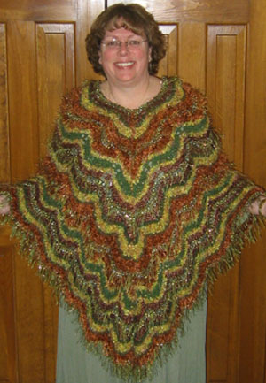 Rust/Green/Yellow Bargello Poncho Using Simultaneous Contrast, designed by Kate Dudding